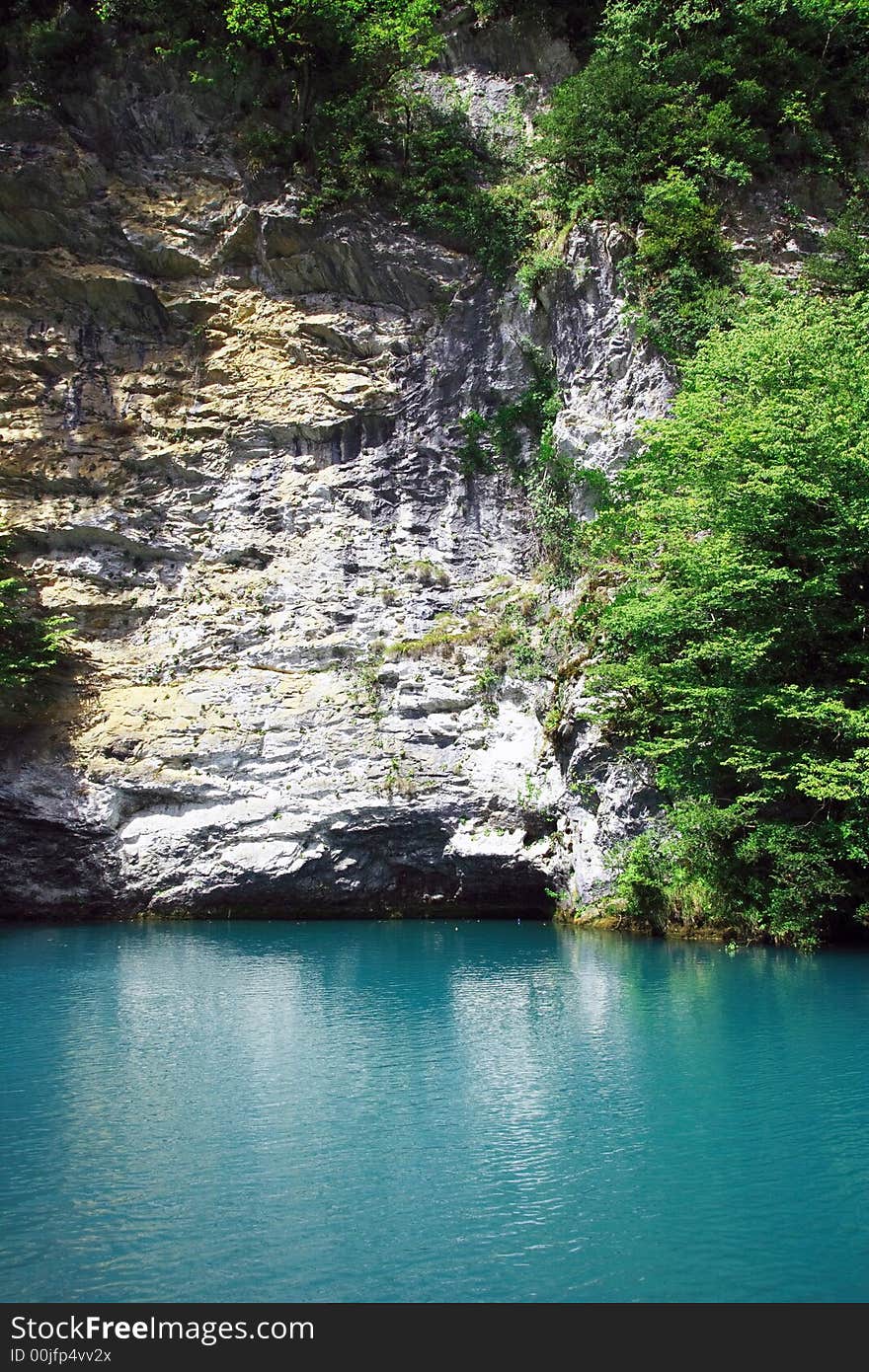 Blue lake in the Caucasian mountains. The Republic of Abkhazia. Blue lake in the Caucasian mountains. The Republic of Abkhazia.