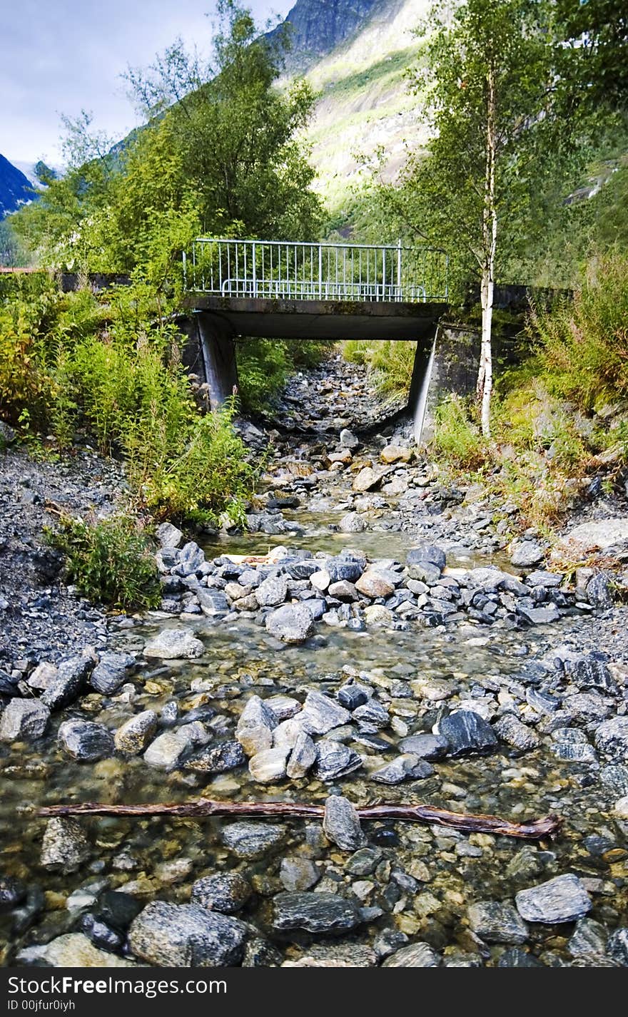 Bridge And Stream. Norway.