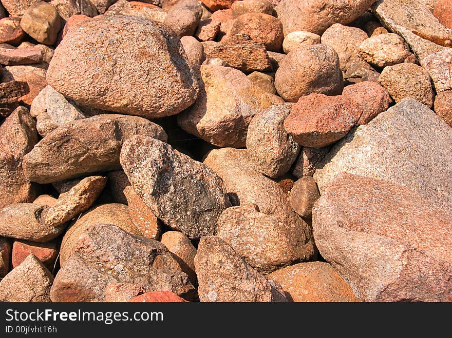 Red stones background or texture. Red stones background or texture