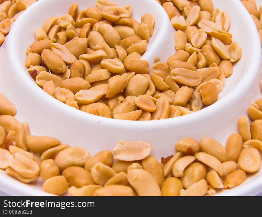 Some peanuts on a plate