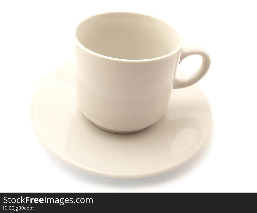 Empty cup on a saucer. isolated on white background