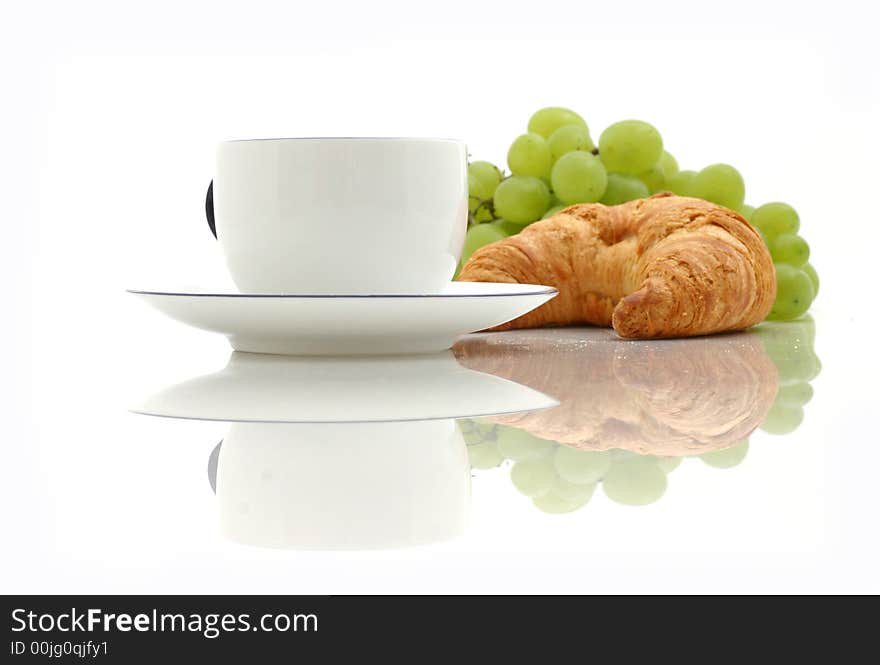 Croissant, cup of coffee