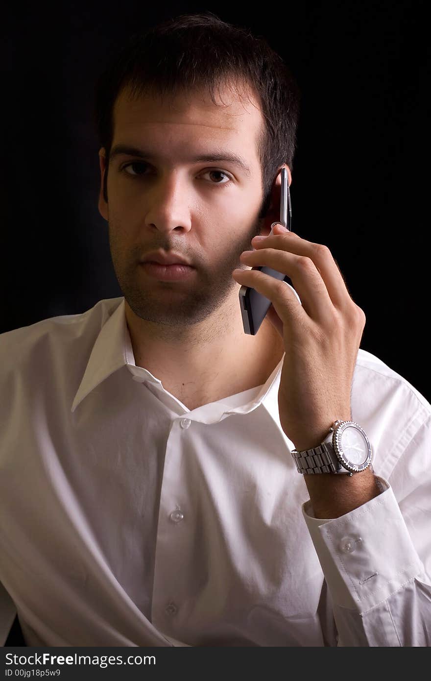 Young businessman speaking on the phone