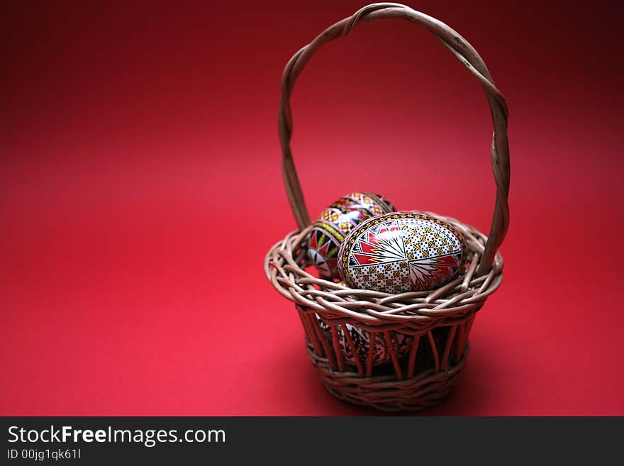 Four easter eggs isolated on red