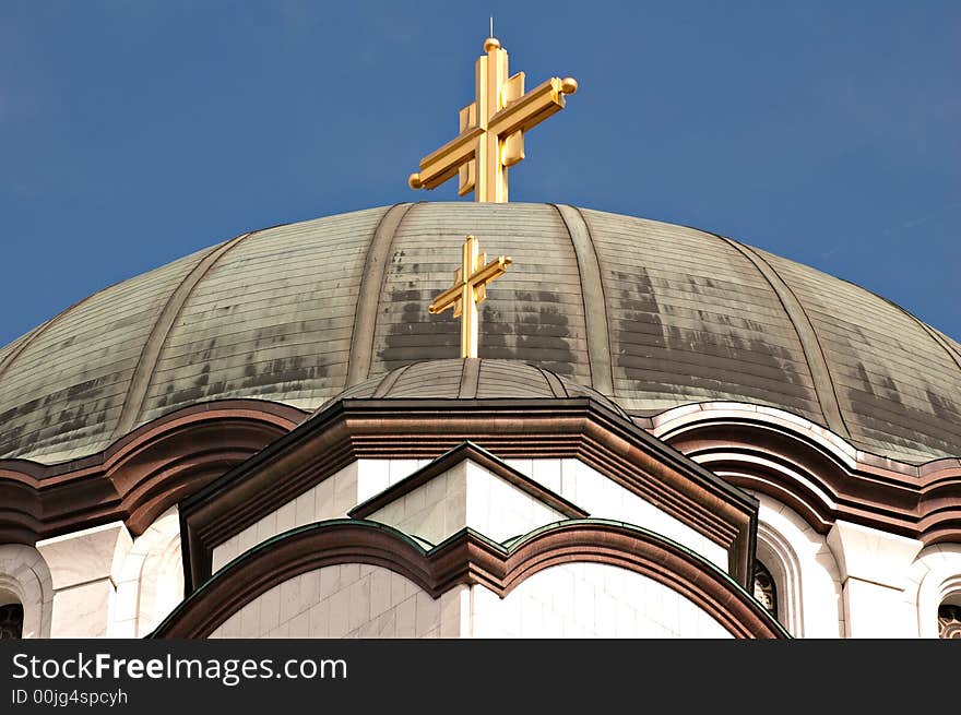 Detail of the main dome and cross of the world's largest Orthodox Temple of St. Sava in Belgrade, Serbia. Detail of the main dome and cross of the world's largest Orthodox Temple of St. Sava in Belgrade, Serbia