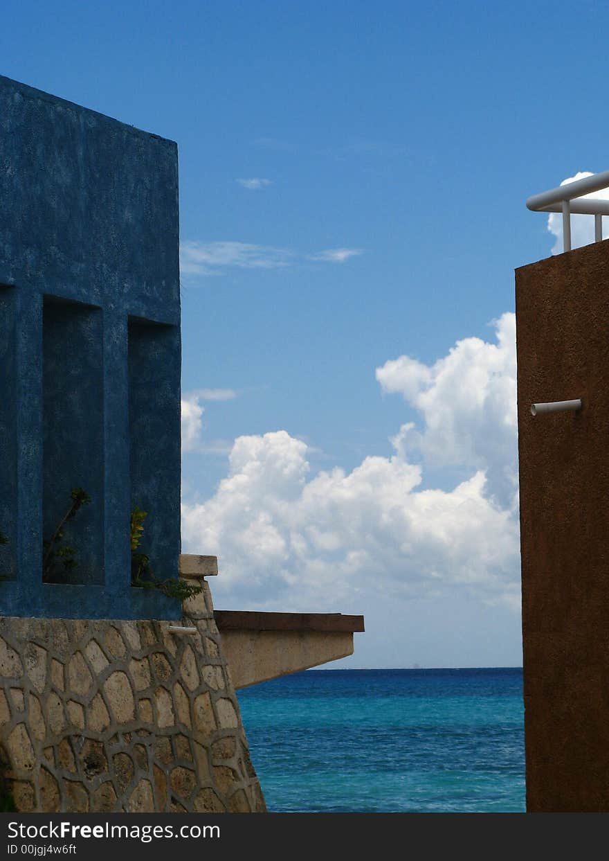 View of the carribean sea from betwen two buildings. View of the carribean sea from betwen two buildings.