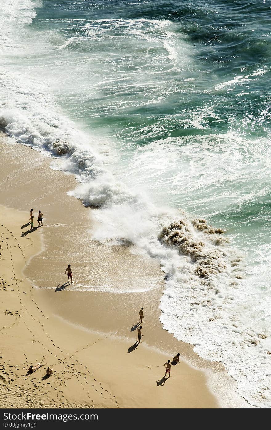 Bathers contemplating the heavy sea, Portugal. Bathers contemplating the heavy sea, Portugal