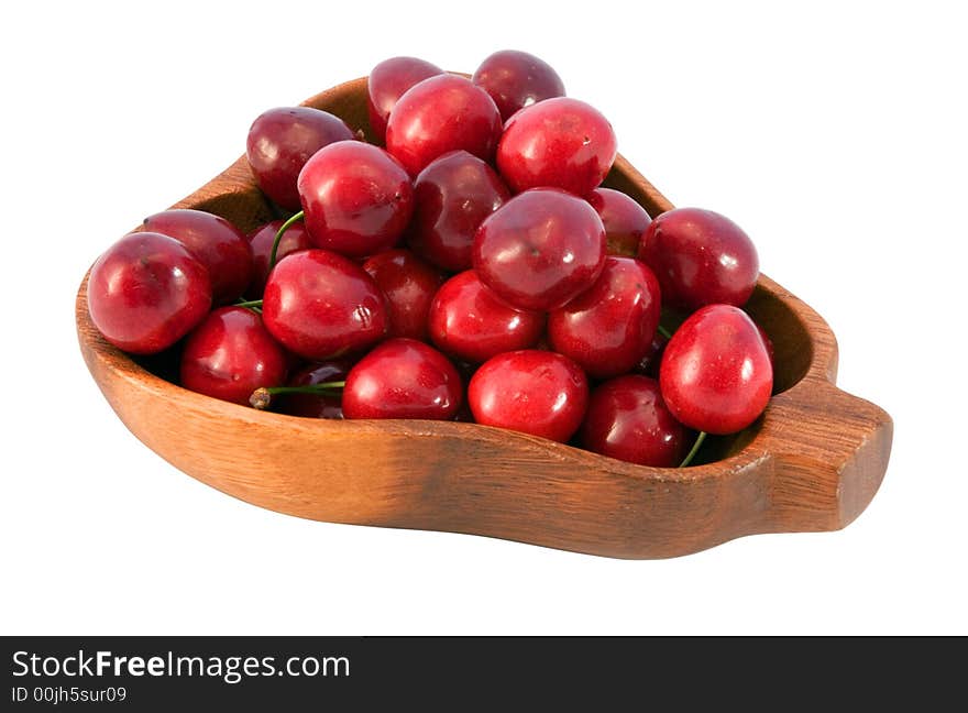 ?herry in bowl from wood isolated on white background with clipping path. ?herry in bowl from wood isolated on white background with clipping path.