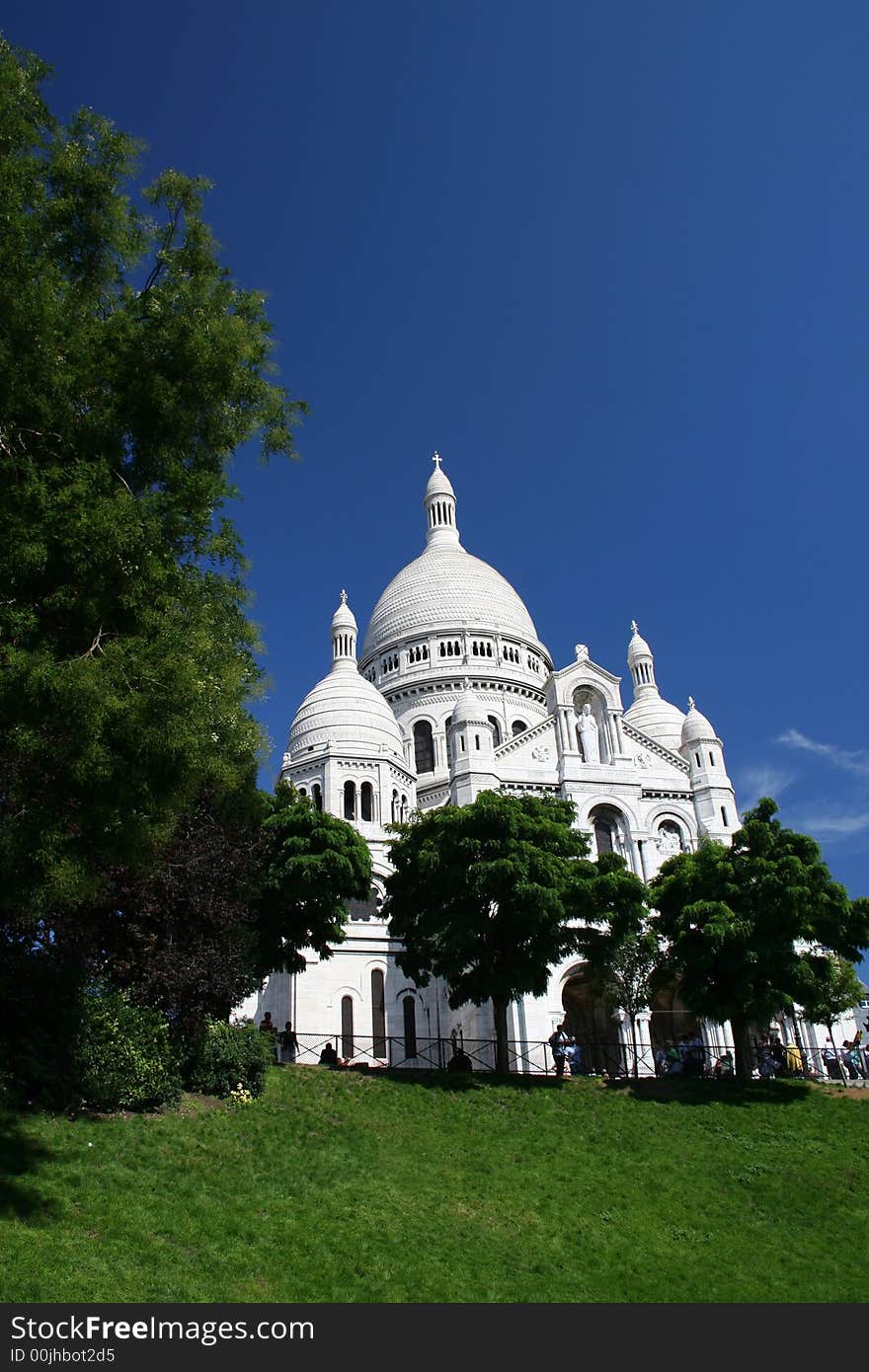 Sacre Coeur in Montmartre on a beautiful summer day in Paris, France