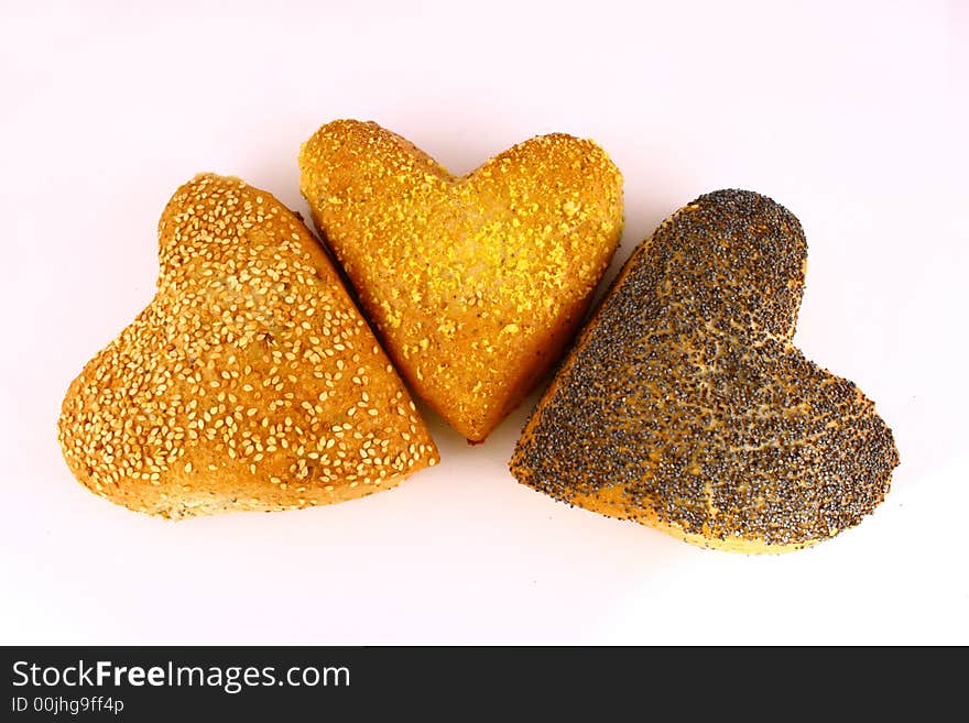 Different bread arranged on table close up. Different bread arranged on table close up