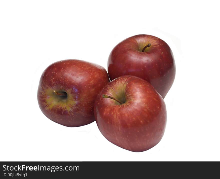 Three red fresh apple isolated