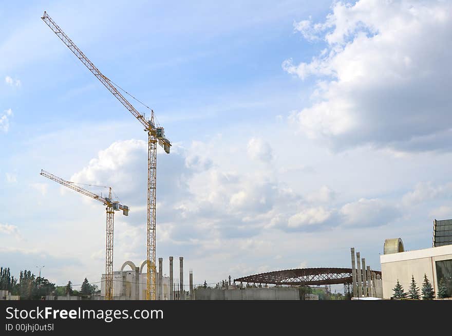 Two tall tower cranes in downtown Moscow, Russia