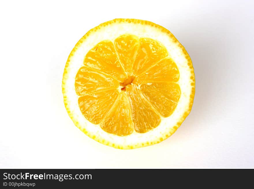 Half a lemon isolated on white background