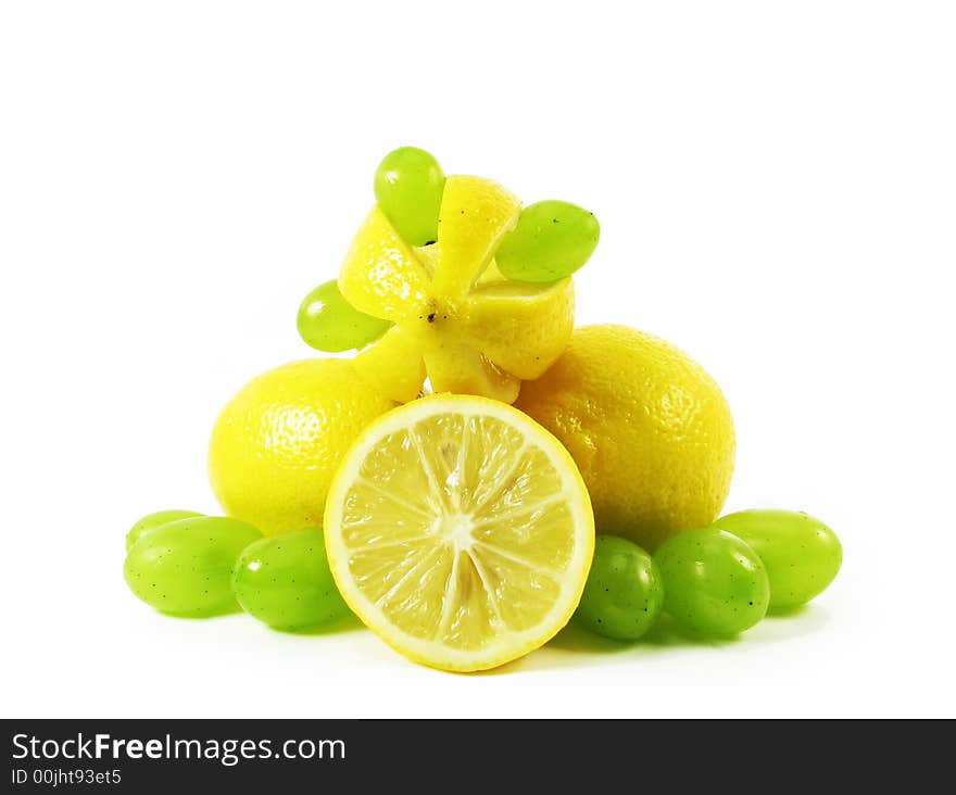 Lemon and grape on white background. Lemon and grape on white background