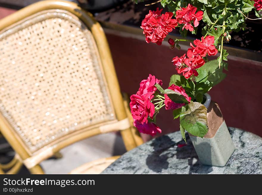 Chair with red flowers