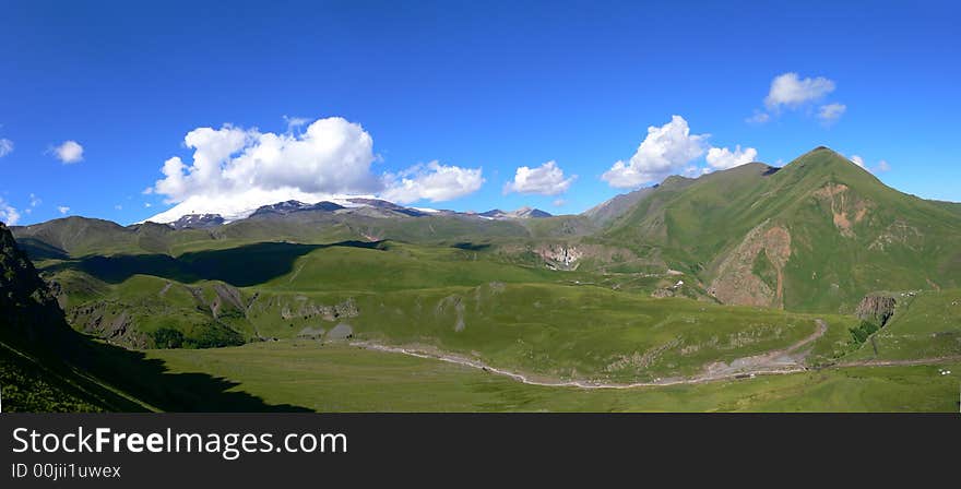 Foothills and Elbrus Mountain in clouds (Caucas). Foothills and Elbrus Mountain in clouds (Caucas)