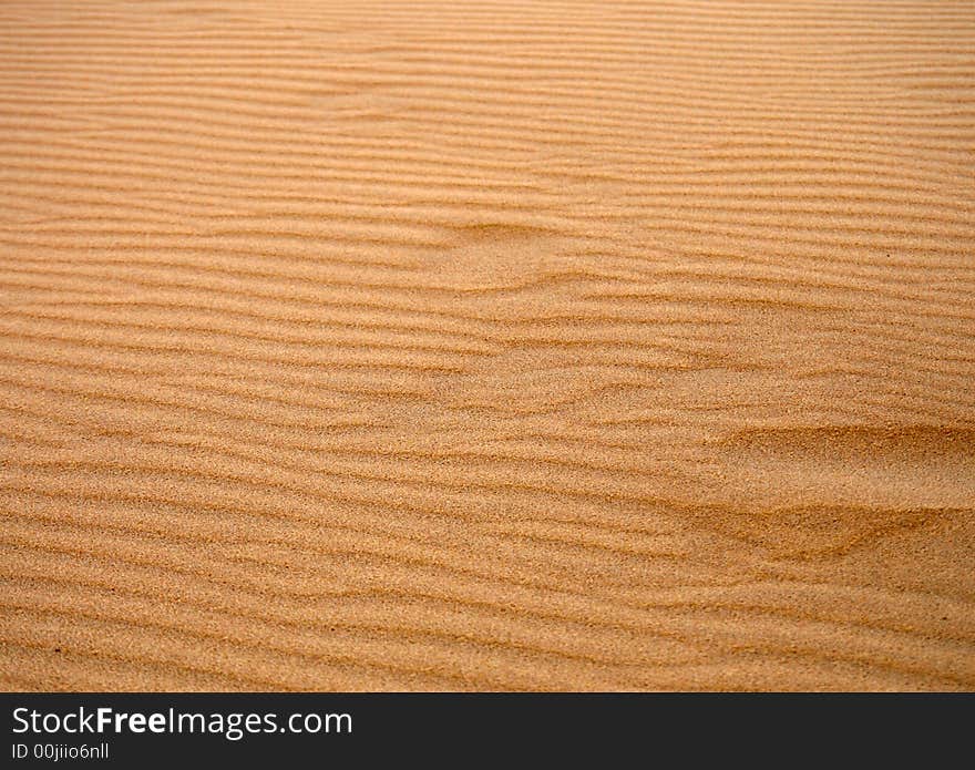 Dune sand texture, 
dark, gold sand