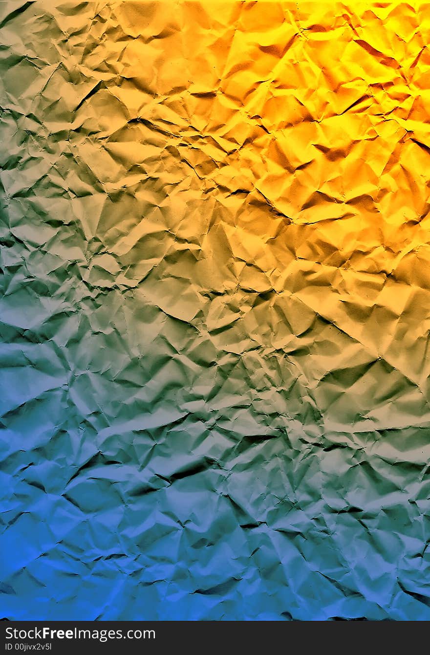 Wrinkled page under a blue and yellow light