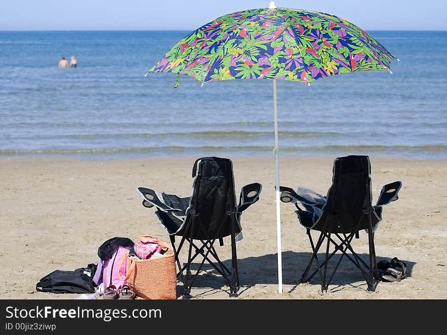 Chairs and umbrella on beach