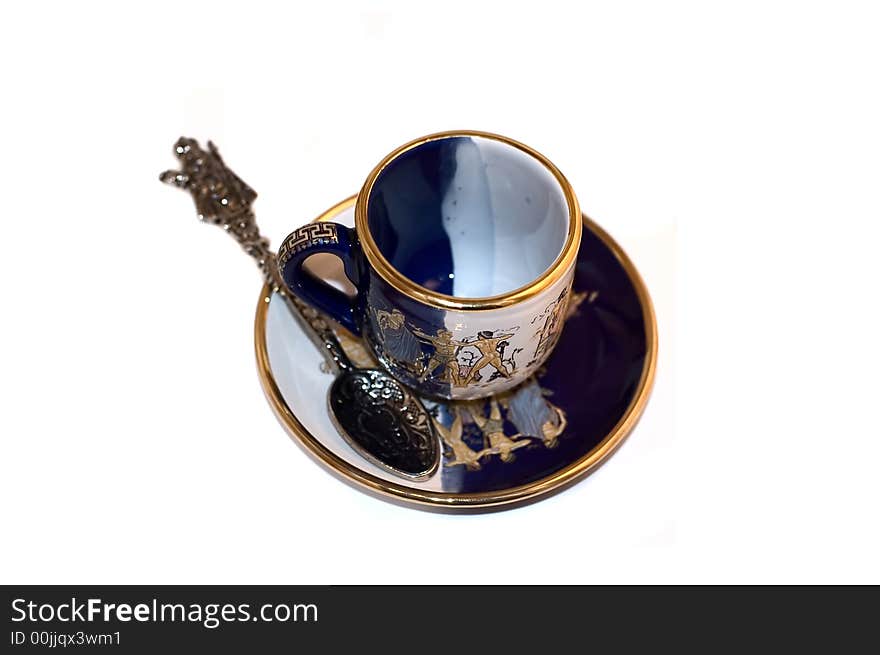 Empty tea cup with spoon and saucer. Empty tea cup with spoon and saucer