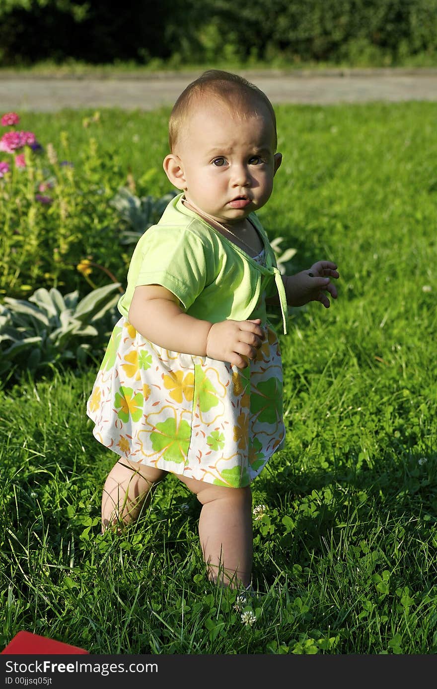 Child On A Grass