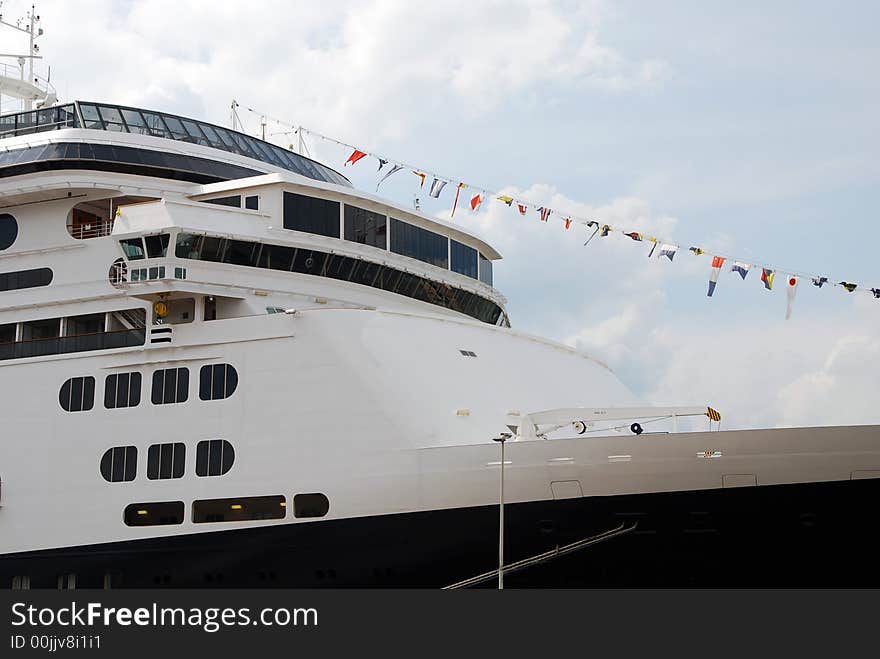 A cruiseship in the port of the city of Rotterdam (Holland). A cruiseship in the port of the city of Rotterdam (Holland)