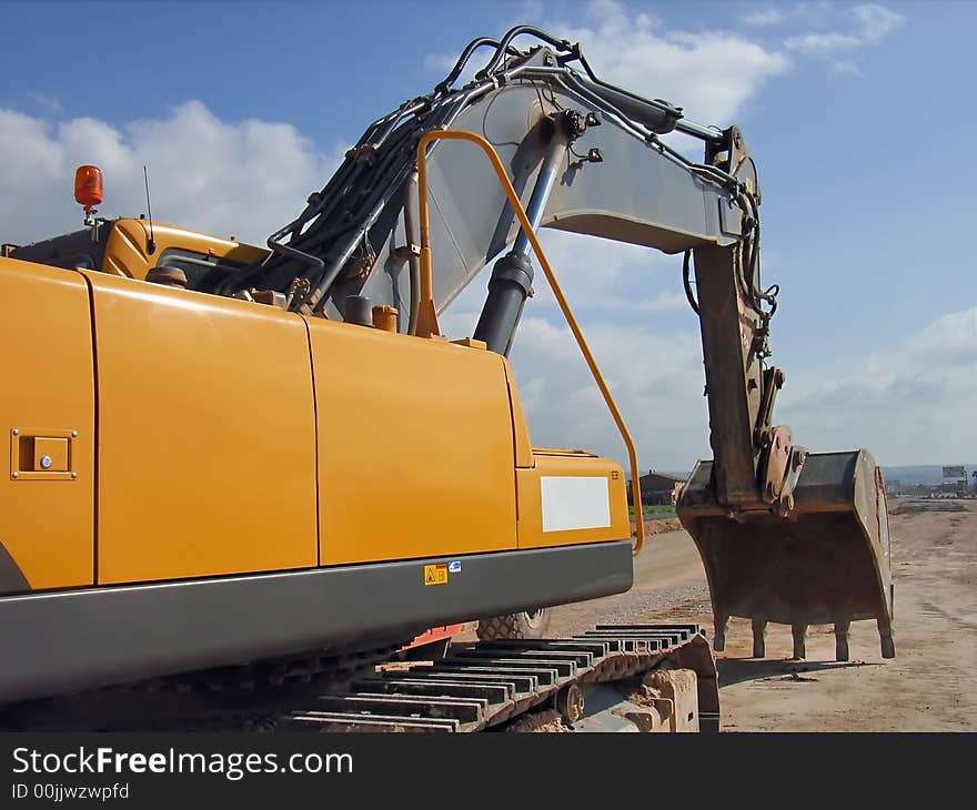 Excavator vehicle used to dig in construction works. Excavator vehicle used to dig in construction works