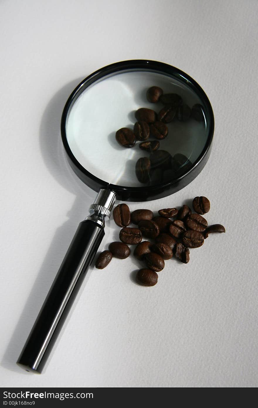 Coffee under a magnifier (grains). Coffee under a magnifier (grains)