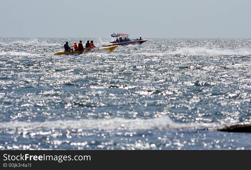 Sea, summer holiday on a high-speed boat. Pleasant morning light.