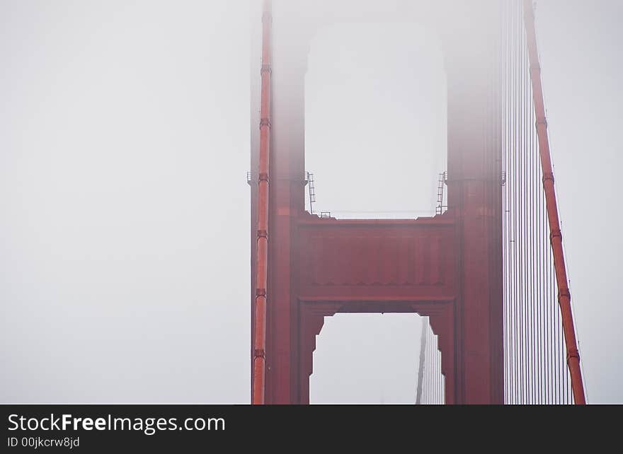 The San Francisco Golden Gate Bridge in the fog. The San Francisco Golden Gate Bridge in the fog