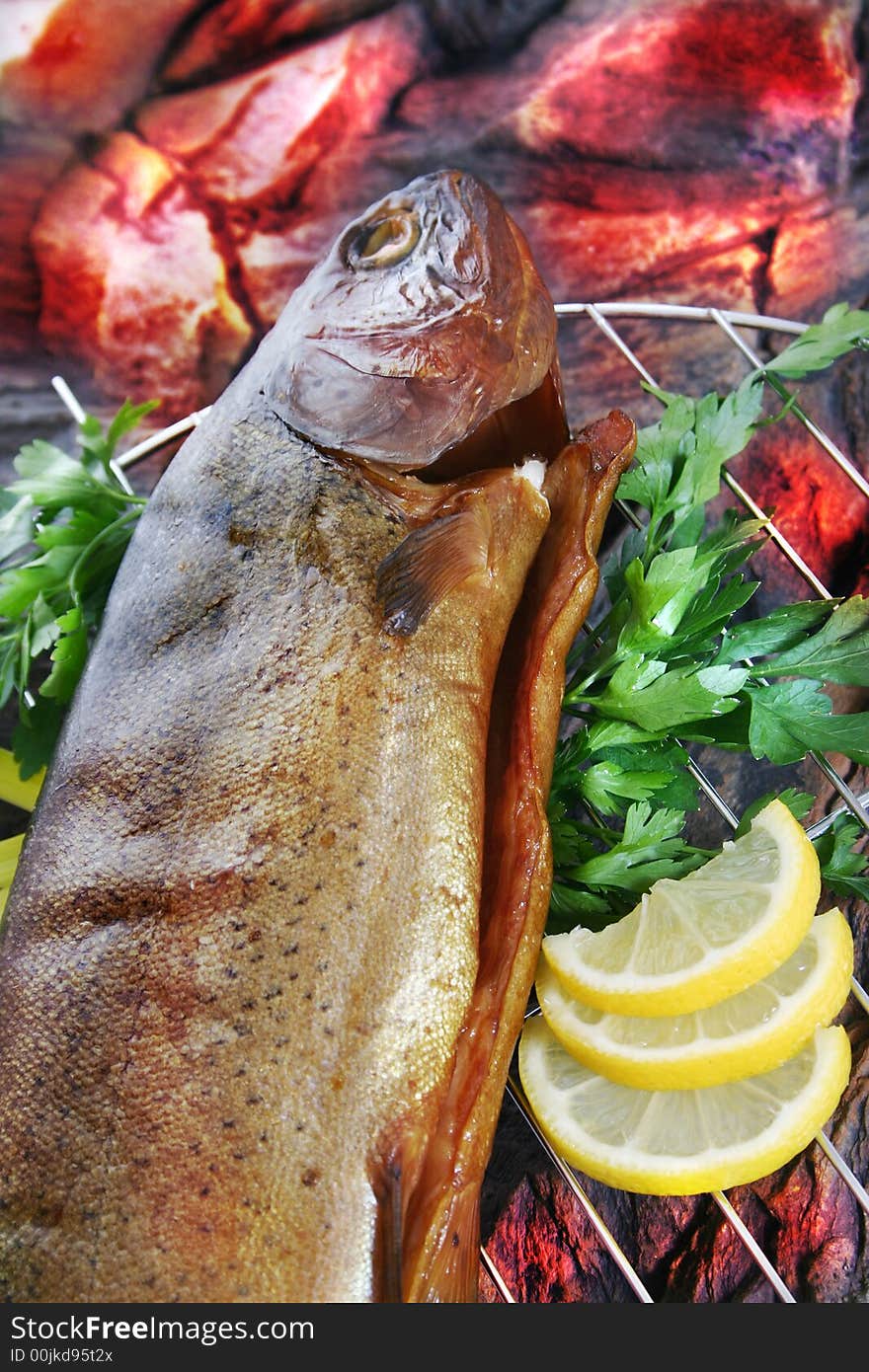 Trout grilled to perfection and served with lemon and barsley. Trout grilled to perfection and served with lemon and barsley