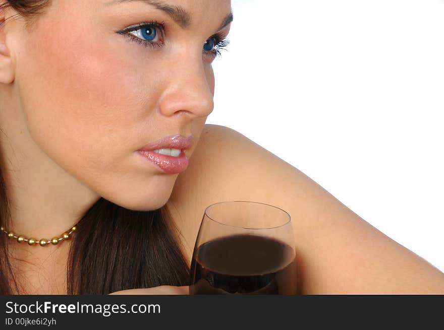 Thoughtful brunette with red wine isolated on white