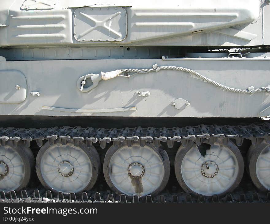 The lateral side of military white tank. The lateral side of military white tank