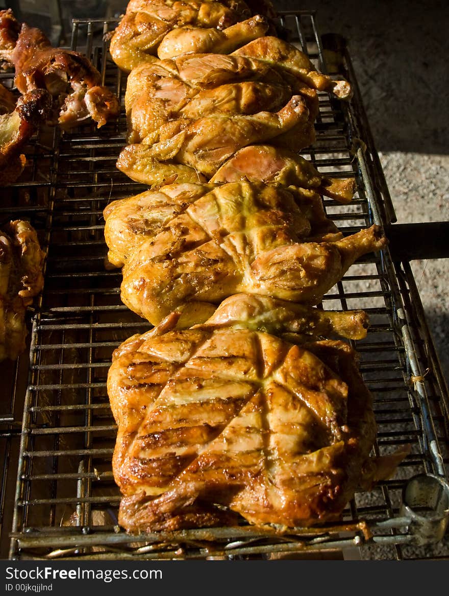 Chicken on a grill for a party. Chicken on a grill for a party