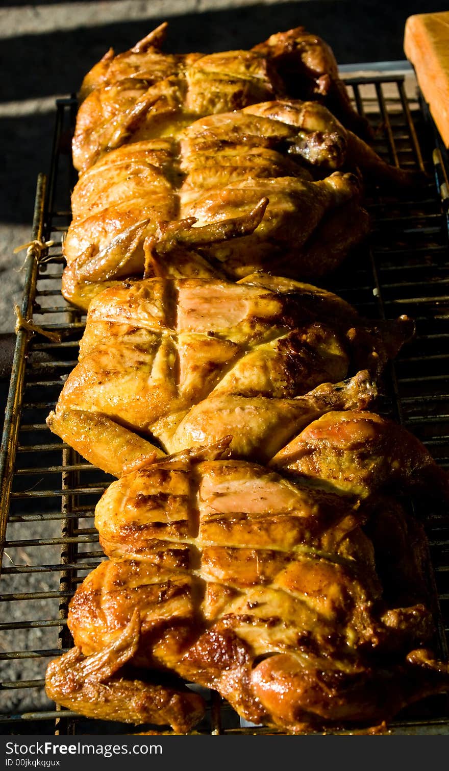 Chicken on a grill for a party. Chicken on a grill for a party