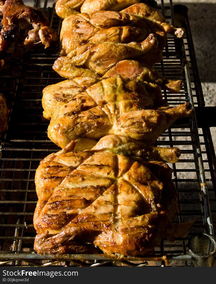 Chicken on a grill for a party. Chicken on a grill for a party