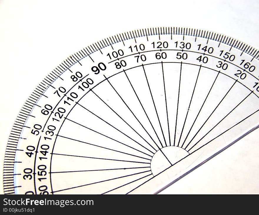 A projector to measure degrees against a white background.