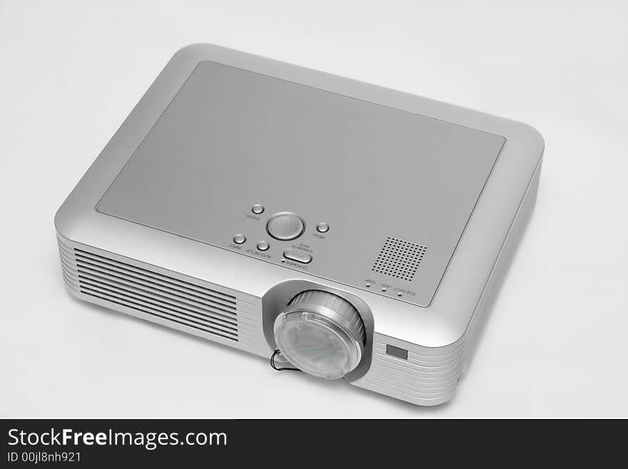 A digital projector isolated on white.