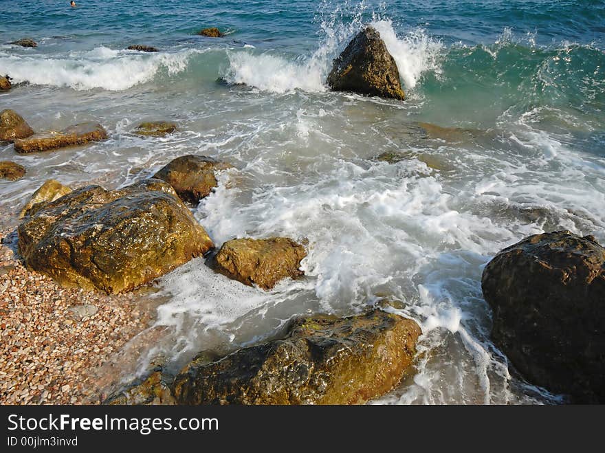 Sea and coast in  summer evening,  surf. Sea and coast in  summer evening,  surf