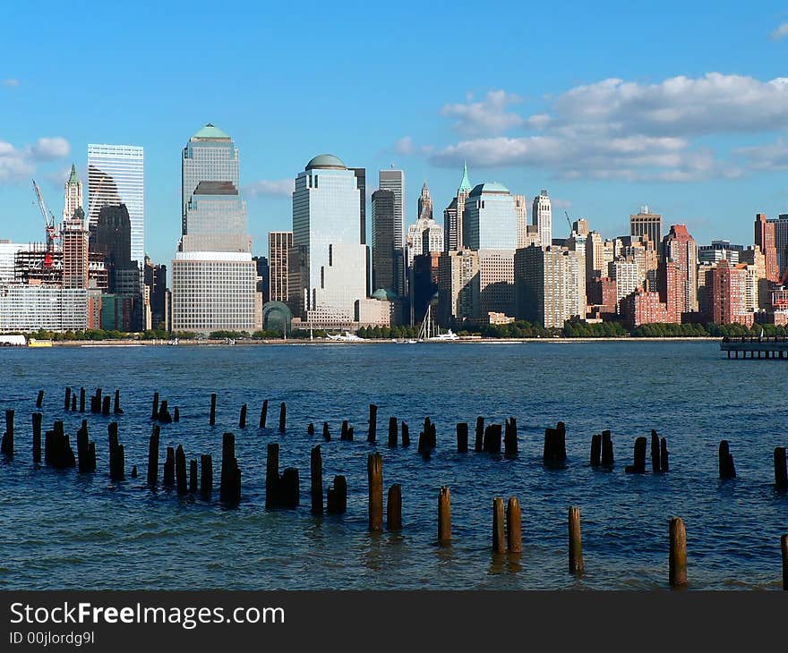 A view of Downton Manhattan's Financial District across the Hudson River. A view of Downton Manhattan's Financial District across the Hudson River