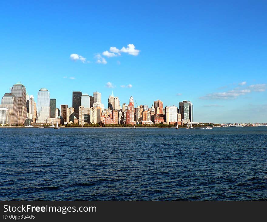 A view of Downton Manhattan's Financial District across the Hudson River. A view of Downton Manhattan's Financial District across the Hudson River