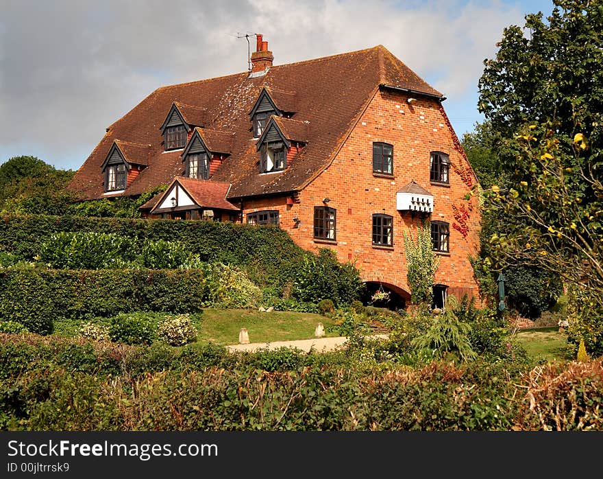 Grand English Country House and Garden with a Dovecote attached to the wall