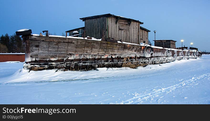 A photo of a big wooden barge