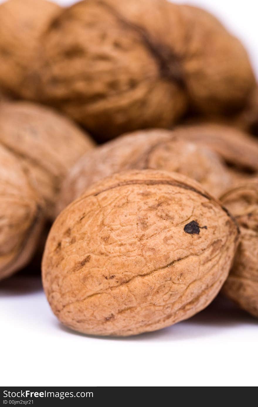 Walnuts close up isolated on white background