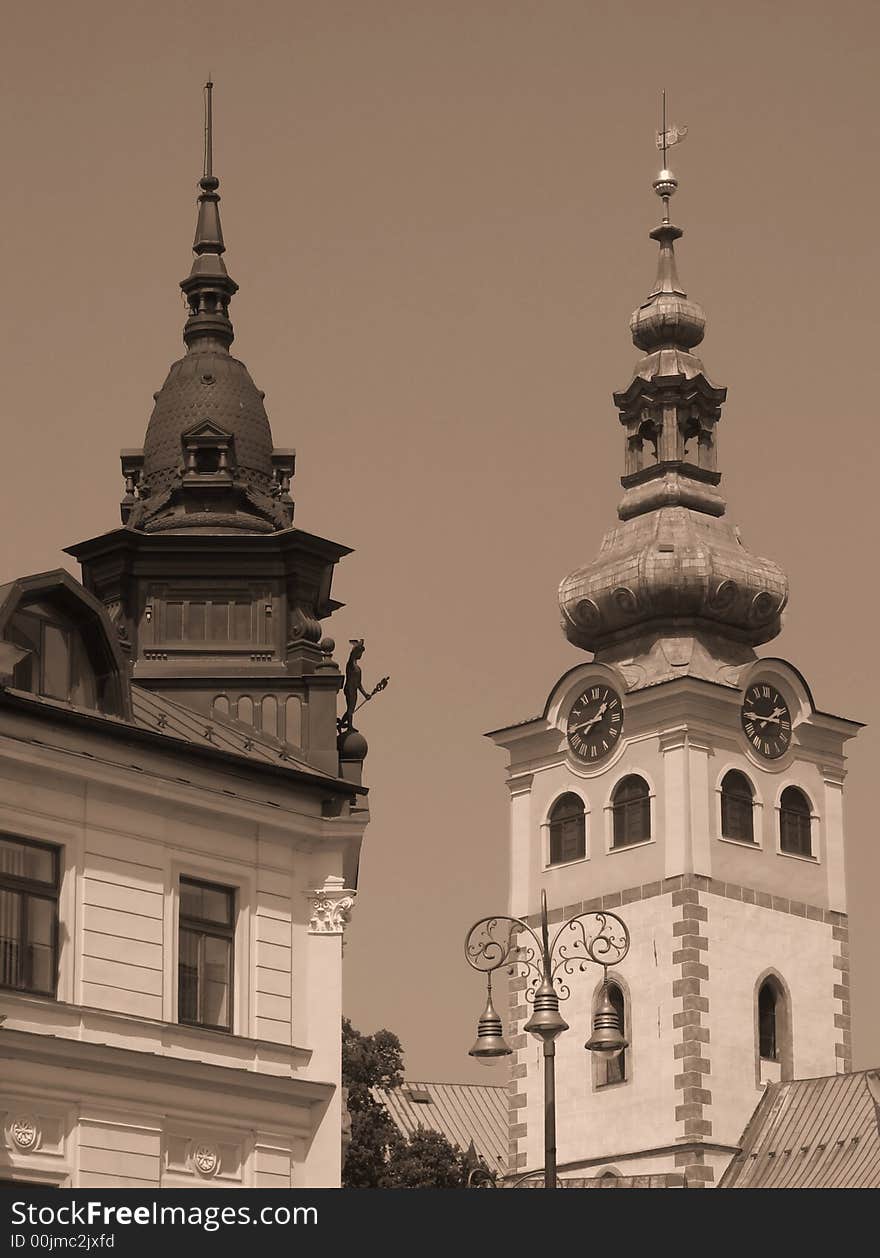 Two towers. Town of Banska Bystrica, Slovakia. Old photo style. Two towers. Town of Banska Bystrica, Slovakia. Old photo style.