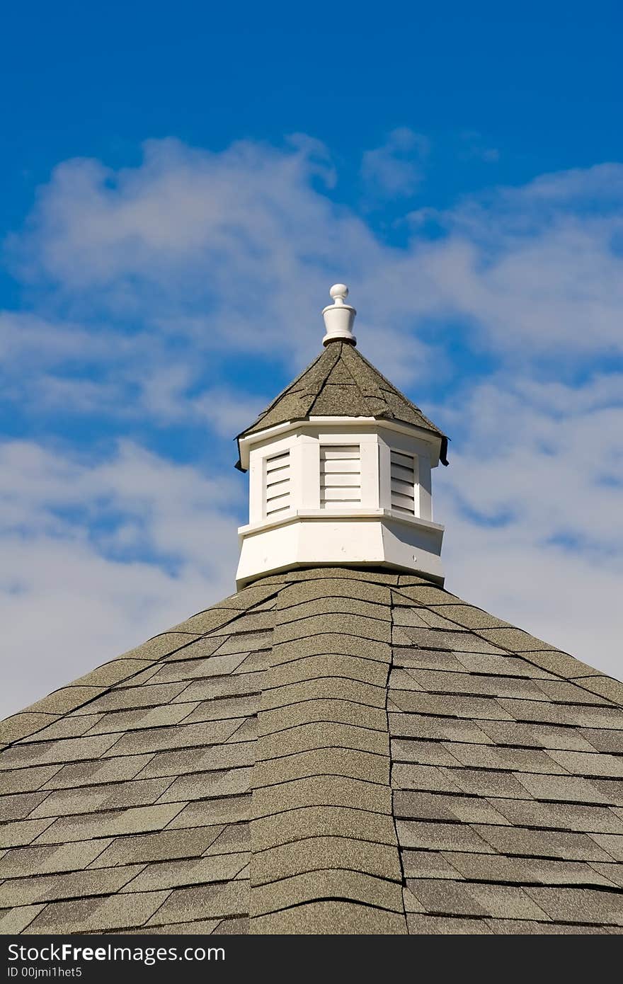 Top of a wedding gazebo under the blue sky. Top of a wedding gazebo under the blue sky