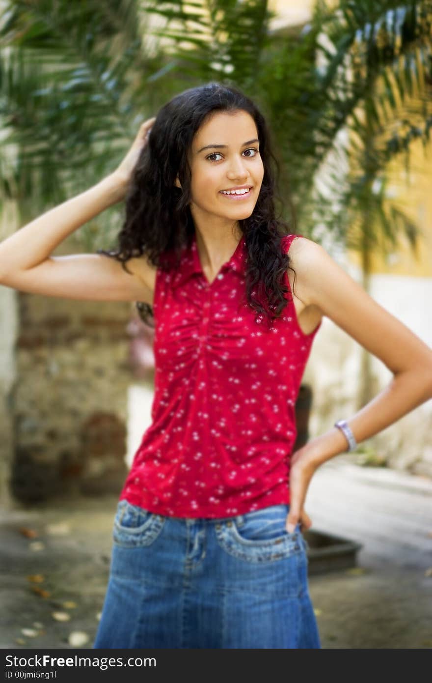 Beautiful smiling young woman in red. Beautiful smiling young woman in red