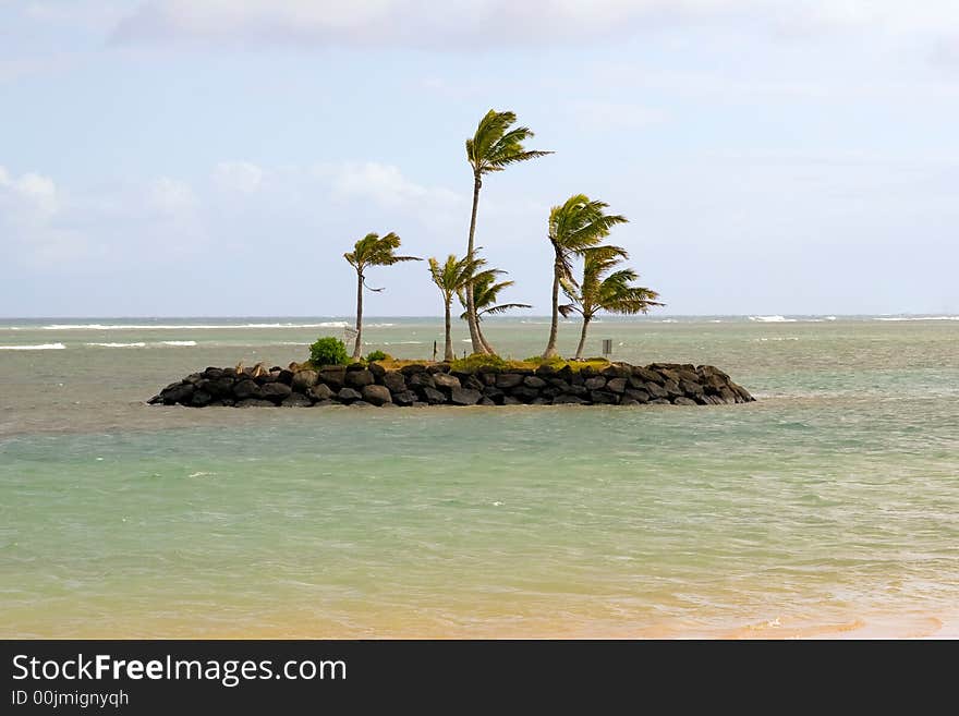 Little rock island sitting in the middle of the ocean. Little rock island sitting in the middle of the ocean