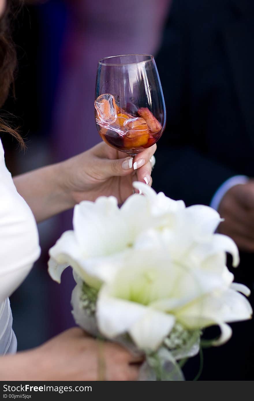 Bride Holds Glass