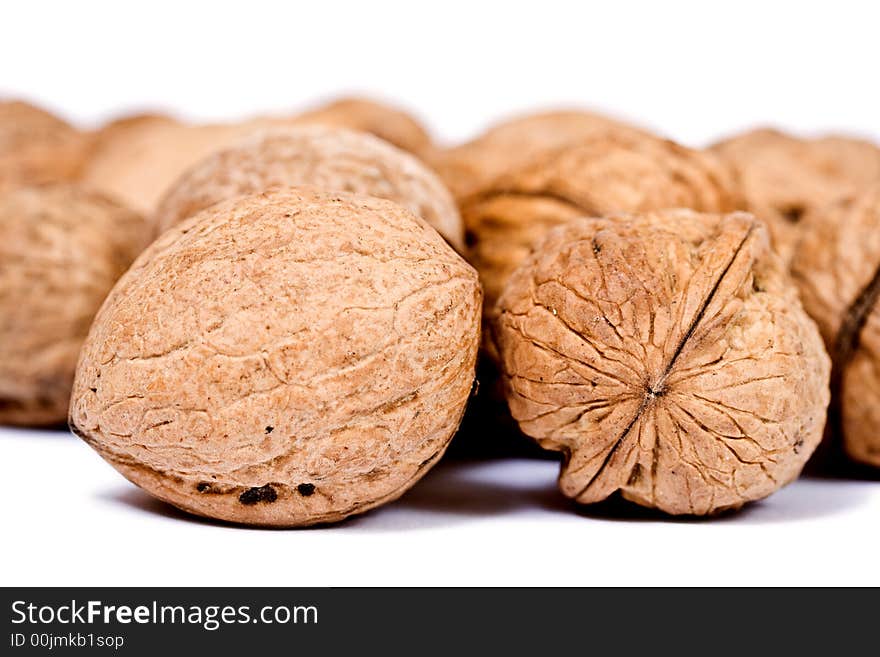 Walnuts close up isolated on white background